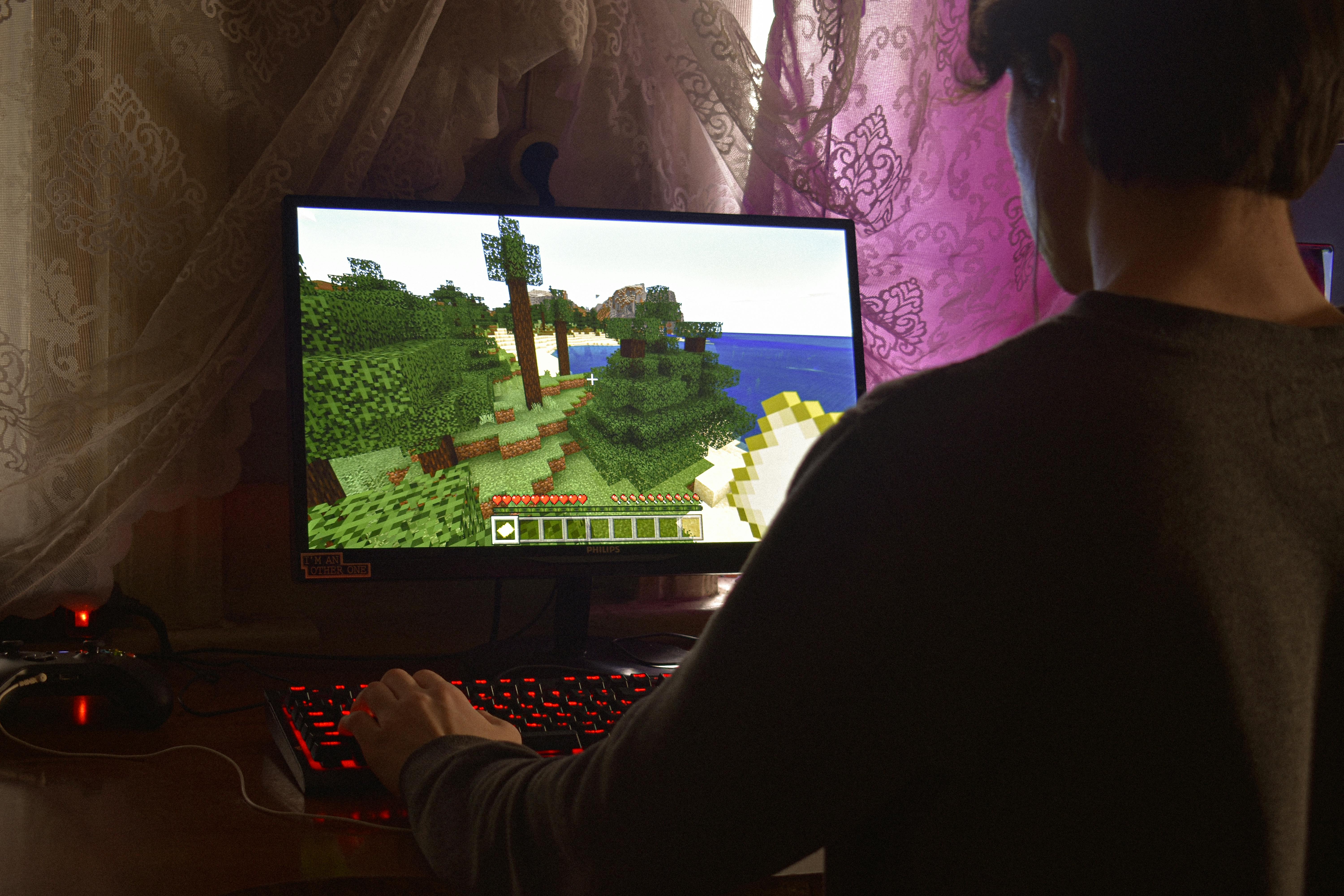 A person playing Minecraft on PC.